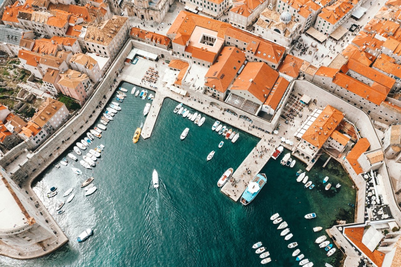 A birds eye view of Dubrovnik, Croatia showing the marina and the terracotta houses