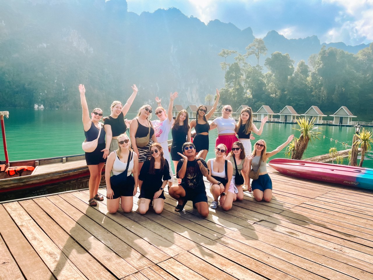 Group of young backpackers at the floating bungalows in Koh Phangan