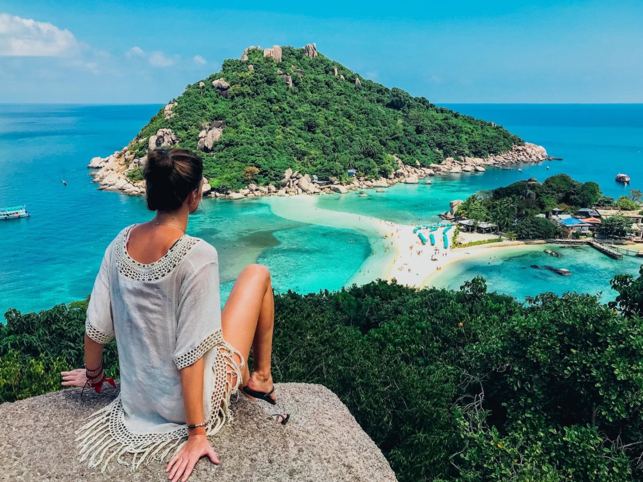 A girl at the top of the viewpoint Koh Nang Yuan in Koh Tao Thailand